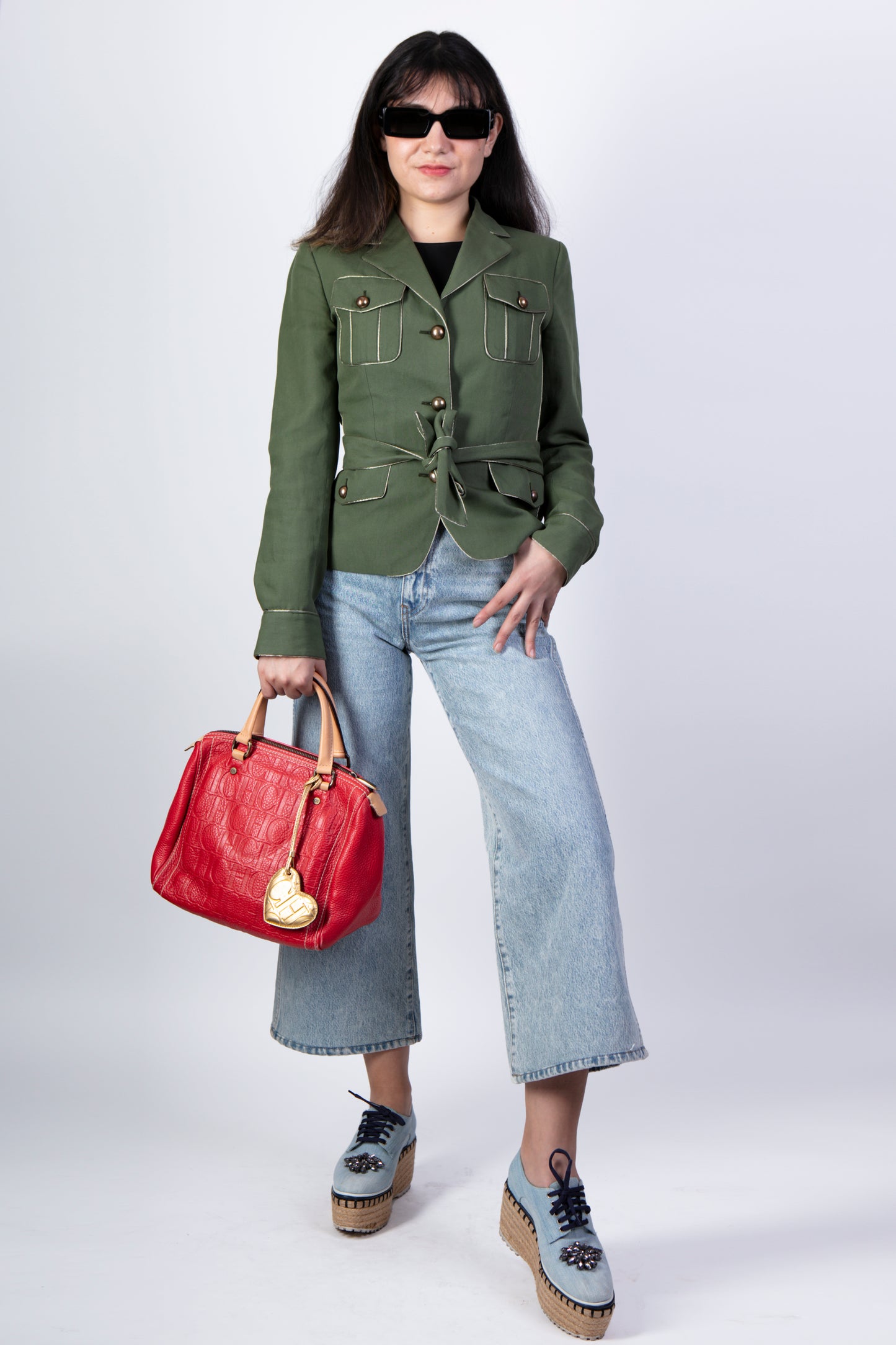 Bolso de cuero rojo con charm dorado Carolina Herrera