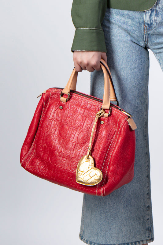 Bolso de cuero rojo con charm dorado Carolina Herrera